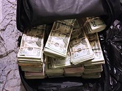  Money seized during an arrest involving 52kg of cocaine.