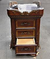 End table used to transport drugs and drug proceeds from NY to Massachusetts.