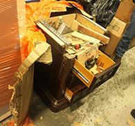 End table with concealed compartment hiding drug profits.