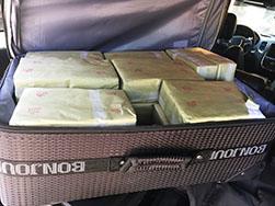Suitcase of bricks filled with heroin