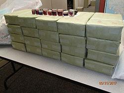 Bricks filled with heroin, ink stamps and branded envelopes