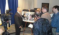 Acting SAC Coleman addressing reporters.