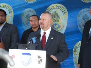 DEA Acting SAC Coleman at the podium