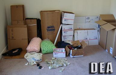 ) Packaging material at a Phoenix residence where agents recovered  over 171 pounds of marijuana, currency and 3 weapons.