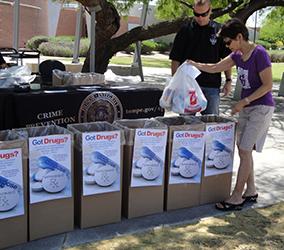 Local resident dropping off expired medications.