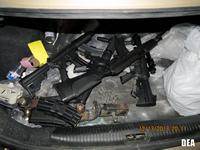 Various weapons seized from a stash house.