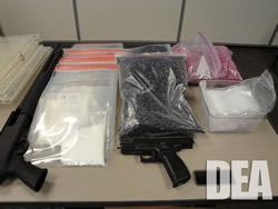 Encapsulating machines; raw powder and empty capsules; plastic bags; shotgun and handgun.