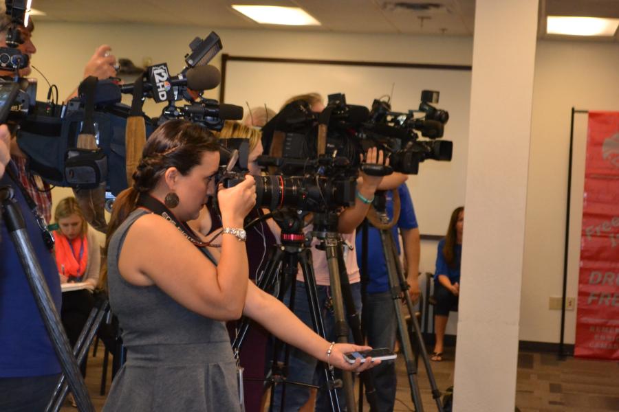 SAC Doug Coleman at podium announcing the Division’s new TIP411 Texting Tip Line.