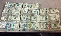 Bundles of cash seized during the operation.