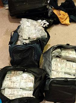 DEA Baltimore recovered three large duffel bags in the basement of E. Hernandez-Barba’s home, the bags were found to contain $2.4 million.