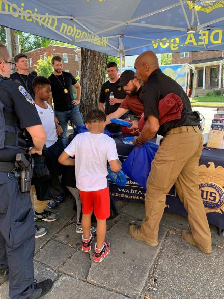 DEA Washington with children from the community