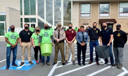 Community members, D.C police, DEA and ATF in group photo