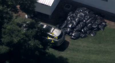 The methamphetamine conversion lab located on Mountain Creek Church Road in Monroe. Common indicators of a conversion lab include piles of garbage bags, blacked-out windows, and strong chemical odors coming from the property.