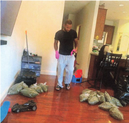 Singletary packaging marijuana for shipment