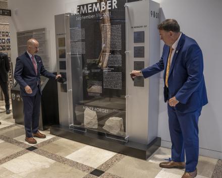 Administrator Cole and Deputy Administrator Salter standing in front of the DEA 9/11 Memorial