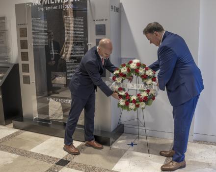Administrator Cole and Deputy Administrator Salter laying a wreath by the 9/11 Memorial