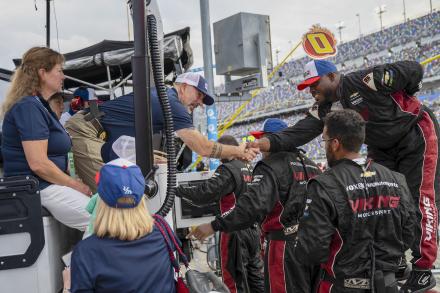 DEA Administrator Terry Cole shakes hands with NASCAR Pit Crew
